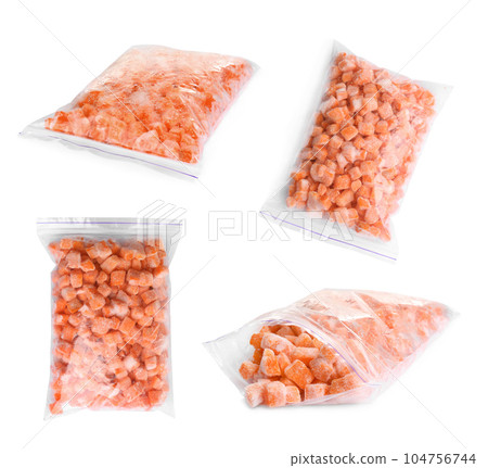 Set of frozen carrots in plastic bags on white background. Vegetable preservation Set of frozen carrots in plastic bags on white background. Vegetable preservation 104756744