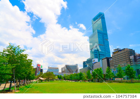 [Osaka Prefecture] Scenery in front of Tennoji Station in the big city with blue sky in July 104757384