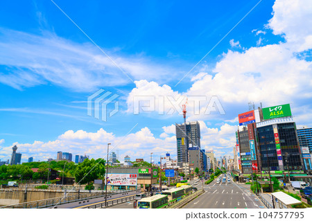 [Osaka Prefecture] Scenery in front of Tennoji Station in the big city with blue sky in July 104757795