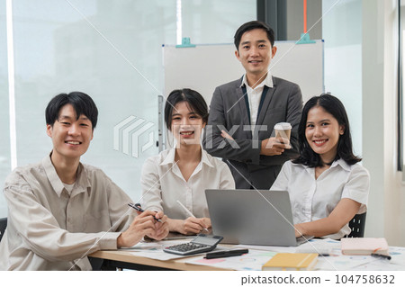 succesful business team smiling with teamwork corporate office colleague 104758632
