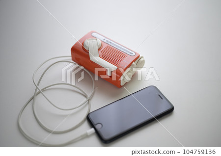 Charging your smartphone from an emergency radio 104759136