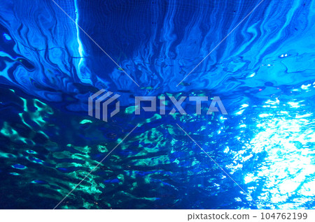 Water surface and blue and green light seen from underwater Water surface and blue and green light seen from underwater 104762199
