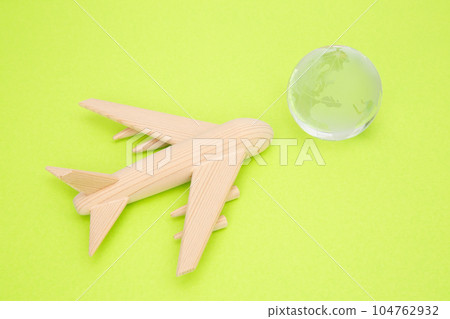 Airplane and the globe 104762932
