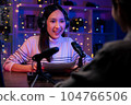 woman use microphones wear headphones with laptop record podcast interview for radio. 104766506