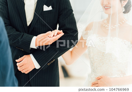Bride and father walking along the virgin road of the church/chapel (Baton Pass Ceremony) 104766969