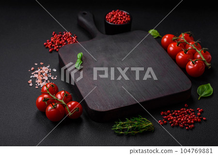 Ingredients for cooking cherry tomatoes, salt, spices and herbs 104769881