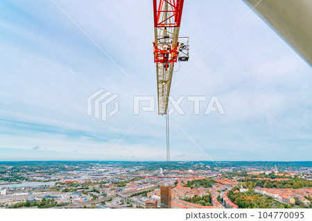 Scandinavian cityscape seen from the tower crane of a skyscraper 104770095
