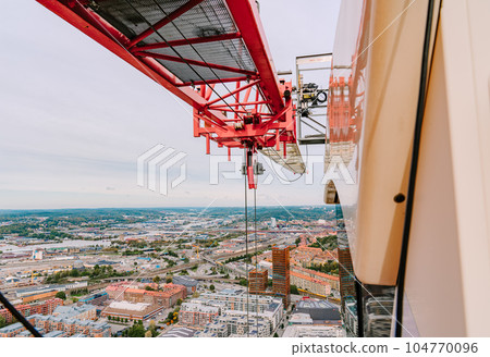 Scandinavian cityscape seen from the tower crane of a skyscraper 104770096