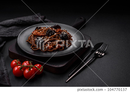 Delicious fresh buckwheat noodles or udon with mushrooms, peppers and other vegetables Delicious fresh buckwheat noodles or udon with mushrooms, peppers and other vegetables 104770137
