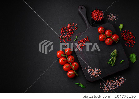Ingredients for cooking cherry tomatoes, salt, spices and herbs Ingredients for cooking cherry tomatoes, salt, spices and herbs 104770150