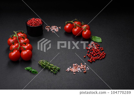 Ingredients for cooking cherry tomatoes, salt, spices and herbs 104770289