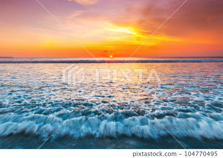 Sunset over sea on Bali 104770495