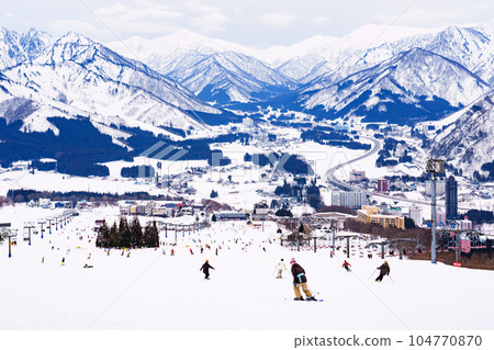 Panoramic view of ski slopes [ Iwappara Ski Resort in Echigo Yuzawa in Niigata Prefecture ] 104770870