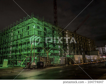 Building under construction, night scene Building under construction, night scene 104774847
