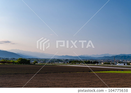 Early summer evening scenery from Yamagata village to Azumino 104775638