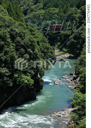 Tarumi Railway crossing the Neo River Tarumi Railway crossing the Neo River 104776491