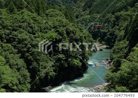 Tarumi Railway crossing the Neo River 104776493