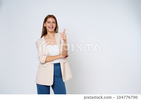 Young woman pointing to empty copy space isolated on white background. Young woman pointing to empty copy space isolated on white background. 104776790