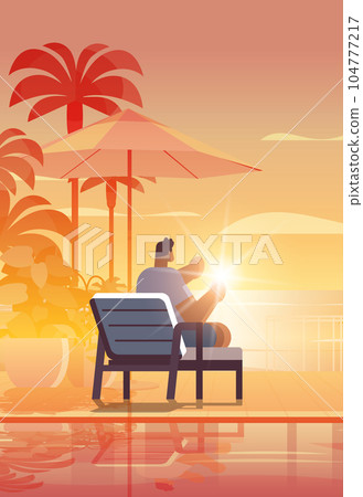 man relaxing at tropical luxury resort hotel beach swimming pool and poolside seating area summer vacation concept man relaxing at tropical luxury resort hotel beach swimming pool and poolside seating area summer vacation concept 104777217