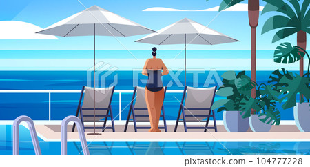 woman relaxing at tropical luxury resort hotel beach swimming pool and poolside seating area summer vacation concept woman relaxing at tropical luxury resort hotel beach swimming pool and poolside seating area summer vacation concept 104777228