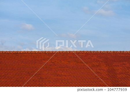 Roof on top and blue sky white cloud background Roof on top and blue sky white cloud background 104777939
