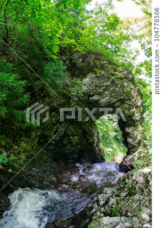 Kuguri Falls under rocks Kuguri Falls under rocks 104778506