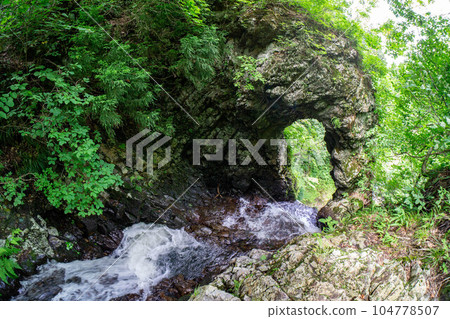 Kuguri Falls under rocks Kuguri Falls under rocks 104778507