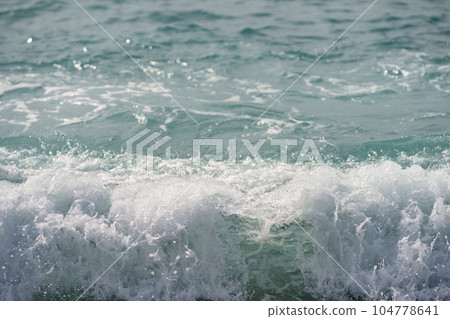 Closeup of coastline wave on mediterranean coast Closeup of coastline wave on mediterranean coast 104778641