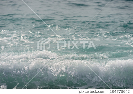 Closeup of coastline wave on mediterranean coast Closeup of coastline wave on mediterranean coast 104778642