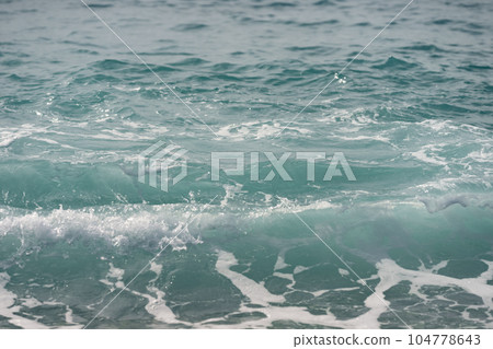Closeup of coastline wave on mediterranean coast Closeup of coastline wave on mediterranean coast 104778643