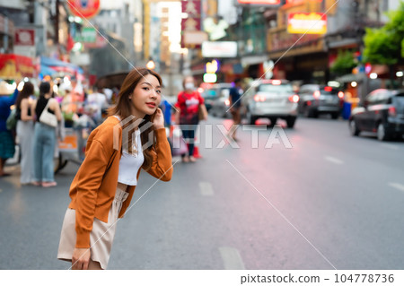 Beauty traveller female in city lifestyle chinatown street food market Bangkok 104778736