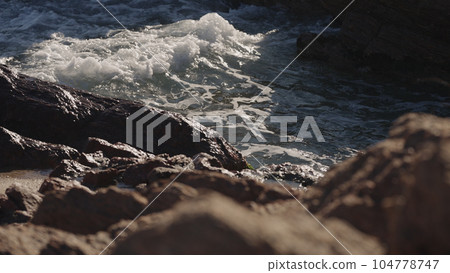 Slow motion of rocks in the sea near Cannes 104778747