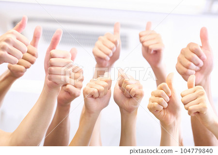 Hands of many people doing thumbs up 104779840