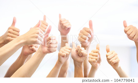 hands of many people doing thumbs up 104779841