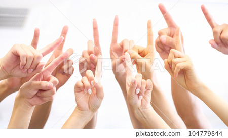 Multiple hands with index fingers up Multiple hands with index fingers up 104779844