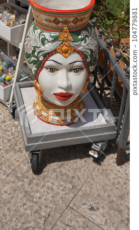 Sicilian traditional ceramics. Plate, dish, bowl, vase. Italy. Sicily. Palermo 104779881