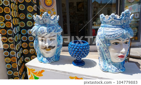 Sicilian traditional ceramics. Plate, dish, bowl, vase. Italy. Sicily. Palermo Sicilian traditional ceramics. Plate, dish, bowl, vase. Italy. Sicily. Palermo 104779883