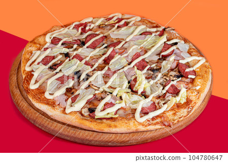 Pizza with bacon cheese and herbs on a wooden plate with cheese and cherry tomatoes. On a colored background. Pizza with bacon cheese and herbs on a wooden plate with cheese and cherry tomatoes. On a colored background. 104780647
