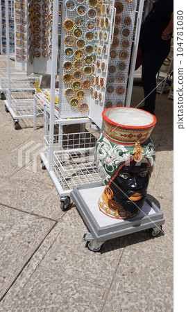 Sicilian traditional ceramics. Plate, dish, bowl, vase. Italy. Sicily. Palermo 104781080