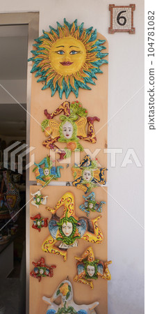 Sicilian traditional ceramics. Plate, dish, bowl, vase. Italy. Sicily. Palermo 104781082