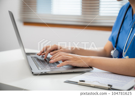 Medical technology network team meeting concept. doctor hands typing on keyboard laptop computer 104781625