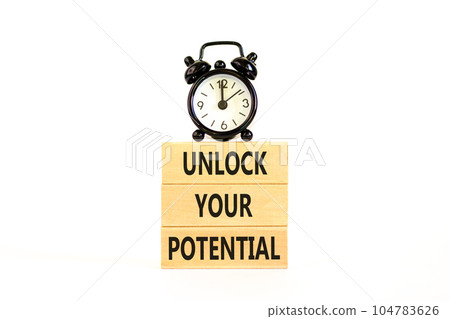 Unlock your potential symbol. Concept words Unlock your potential on wooden blocks. Black alarm clock. Beautiful white background. Business, psychological unlock your potential concept. Copy space. Unlock your potential symbol. Concept words Unlock your potential on wooden blocks. Black alarm clock. Beautiful white background. Business, psychological unlock your potential concept. Copy space. 104783626