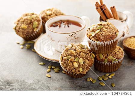 Healthy pumpkin muffins with tea and spices Healthy pumpkin muffins with tea and spices 104784561