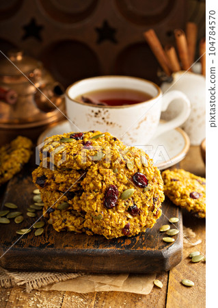 Breakfast cookies with pumpkin puree, cranberry and seeds 104784570