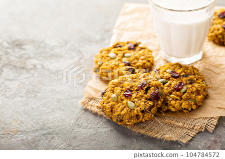 Breakfast cookies with pumpkin puree, cranberry and seeds 104784572
