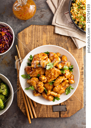 Spicy sweet and sour chicken with rice and cabbage Spicy sweet and sour chicken with rice and cabbage 104784589