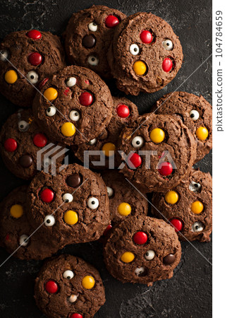 Chocolate monster cookies homemade treats for Halloween Chocolate monster cookies homemade treats for Halloween 104784659