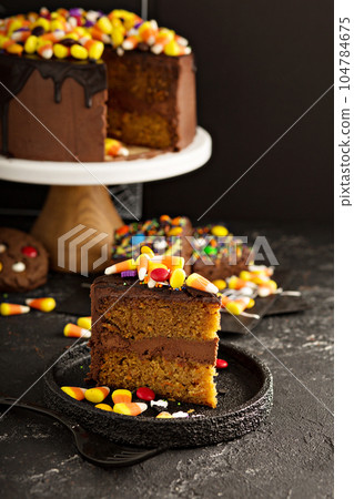 Chocolate and candy corn cake 104784675