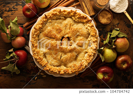 Apple pie decorated with fall leaves Apple pie decorated with fall leaves 104784742