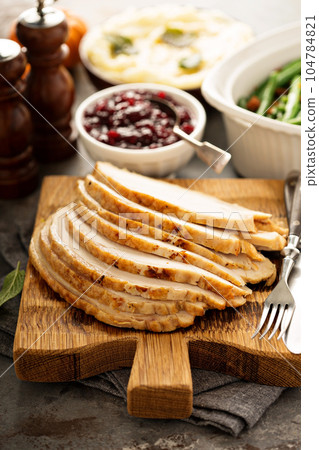 Sliced roasted turkey breast for Thanksgiving or Christmas Sliced roasted turkey breast for Thanksgiving or Christmas 104784821